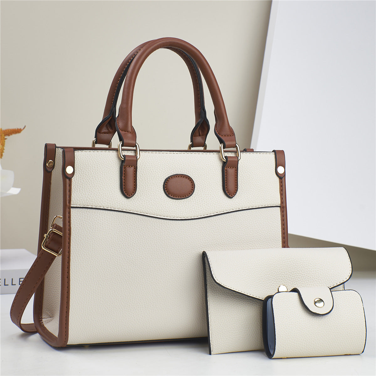 Golden Heir three-piece shoulder bag set for women, featuring stylish mother-and-child bags with versatile designs and elegant details.