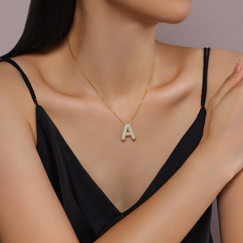 Golden Heir bubble letter W pendant necklace with S925 silver and gold electroplating, featuring moissanite accents and trendy jewelry design.
