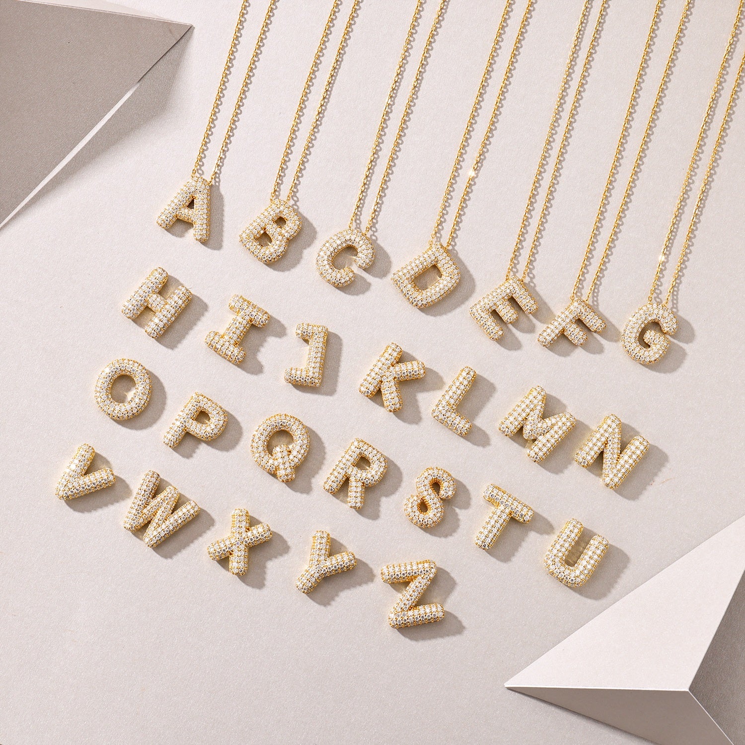 Golden Heir bubble letter W pendant necklace with S925 silver and gold electroplating, featuring moissanite accents.