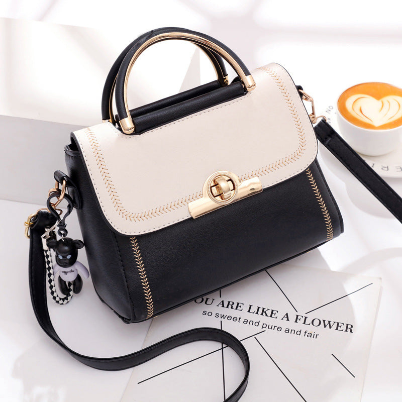 Golden Heir embroidered lace crossbody bag for women, featuring intricate lace embroidery and compact bag design.
