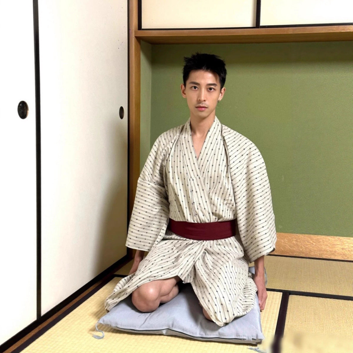 Golden Heir men's traditional Japanese kimono bath robe with intricate patterns and a comfortable fit, displayed on a hanger.