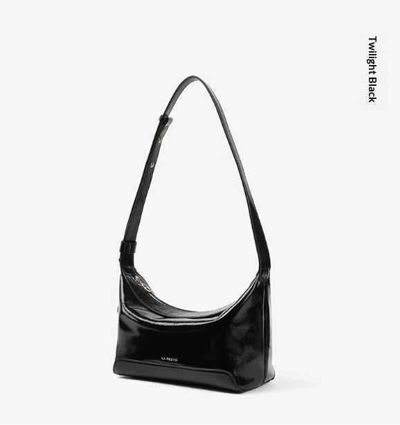 Black full-grain leather women's crossbody bag by Golden Heir, featuring a genuine leather handbag with a sleek, structured design.