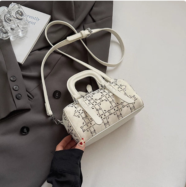 Golden Heir Korean-style minimalist cylindrical tote bag, versatile niche bag with sleek design and durable material.