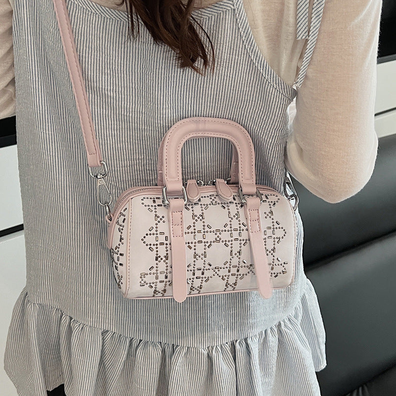 Korean-style minimalist cylindrical tote bag from Golden Heir, versatile and sleek for everyday use, shown in neutral color.