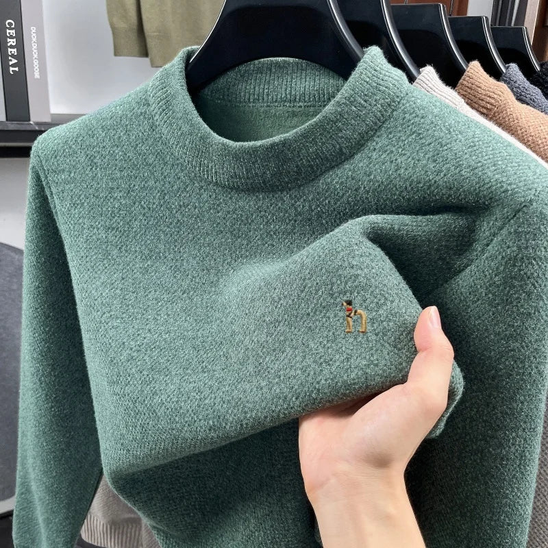 Golden Heir men's long sleeve crewneck top in a soft, stylish fabric, shown in a close-up view highlighting the fit and texture.