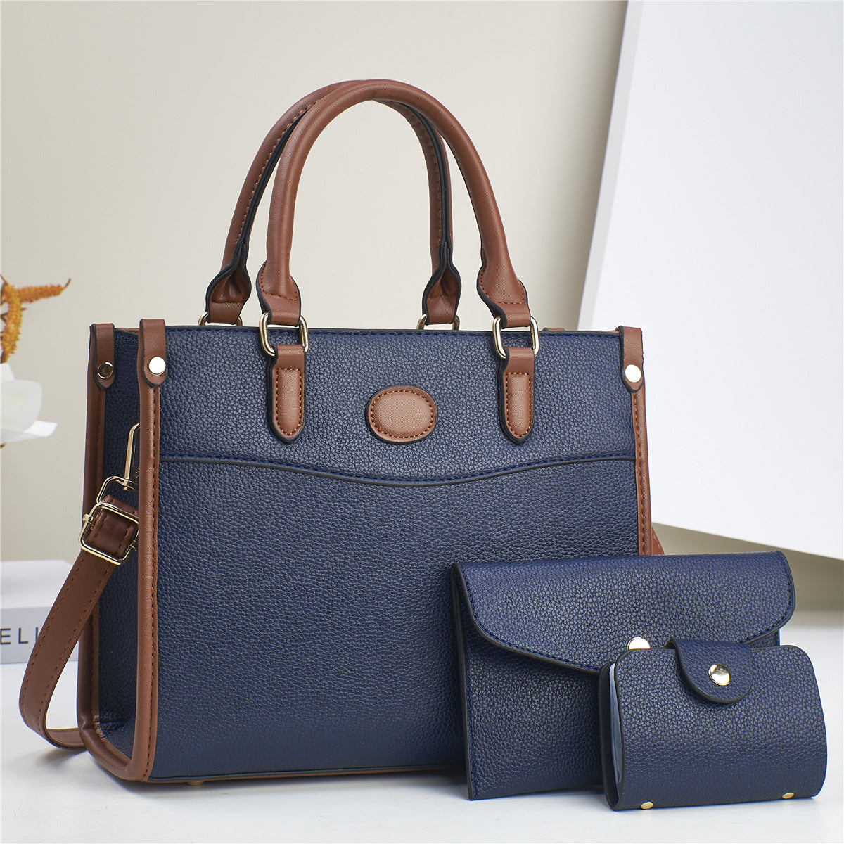 Golden Heir stylish three-piece shoulder bag set for women, featuring matching mother-and-child bags with elegant designs.