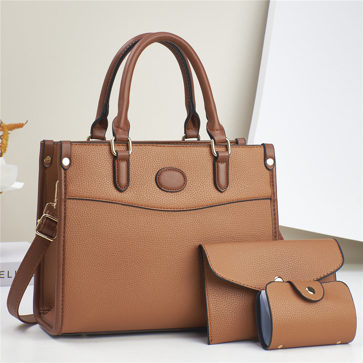 Golden Heir stylish three-piece shoulder bag set for women, includes mother-and-child bags in elegant design.